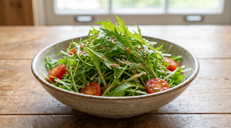 Feathery mizuna leaves, fresh in a bright sesame salad.