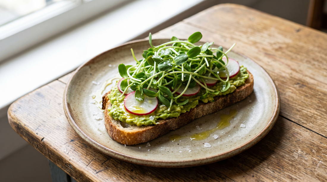 Crunchy sunflower microgreens on fresh avocado toast.