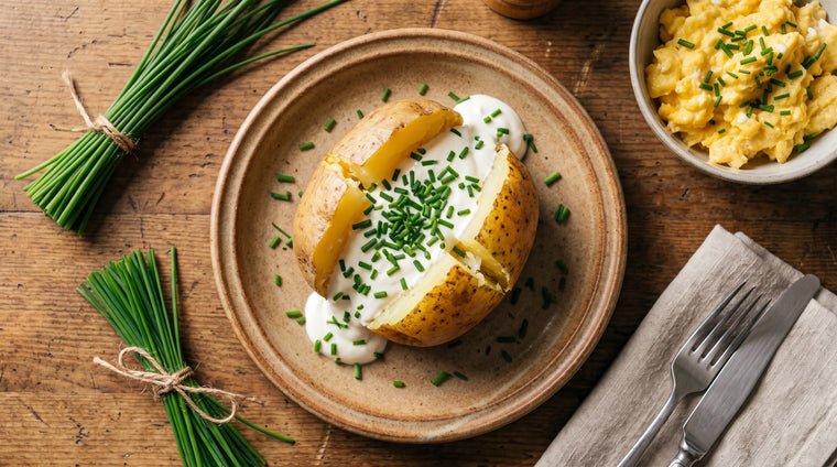 Freshly snipped chives over a baked potato and scrambled eggs.