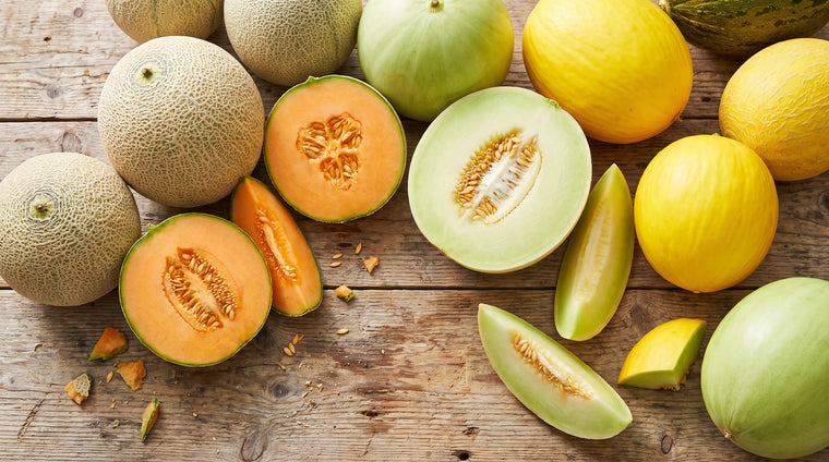 Cantaloupe, honeydew, and canary melons, picked ripe and sweet from the summer garden.